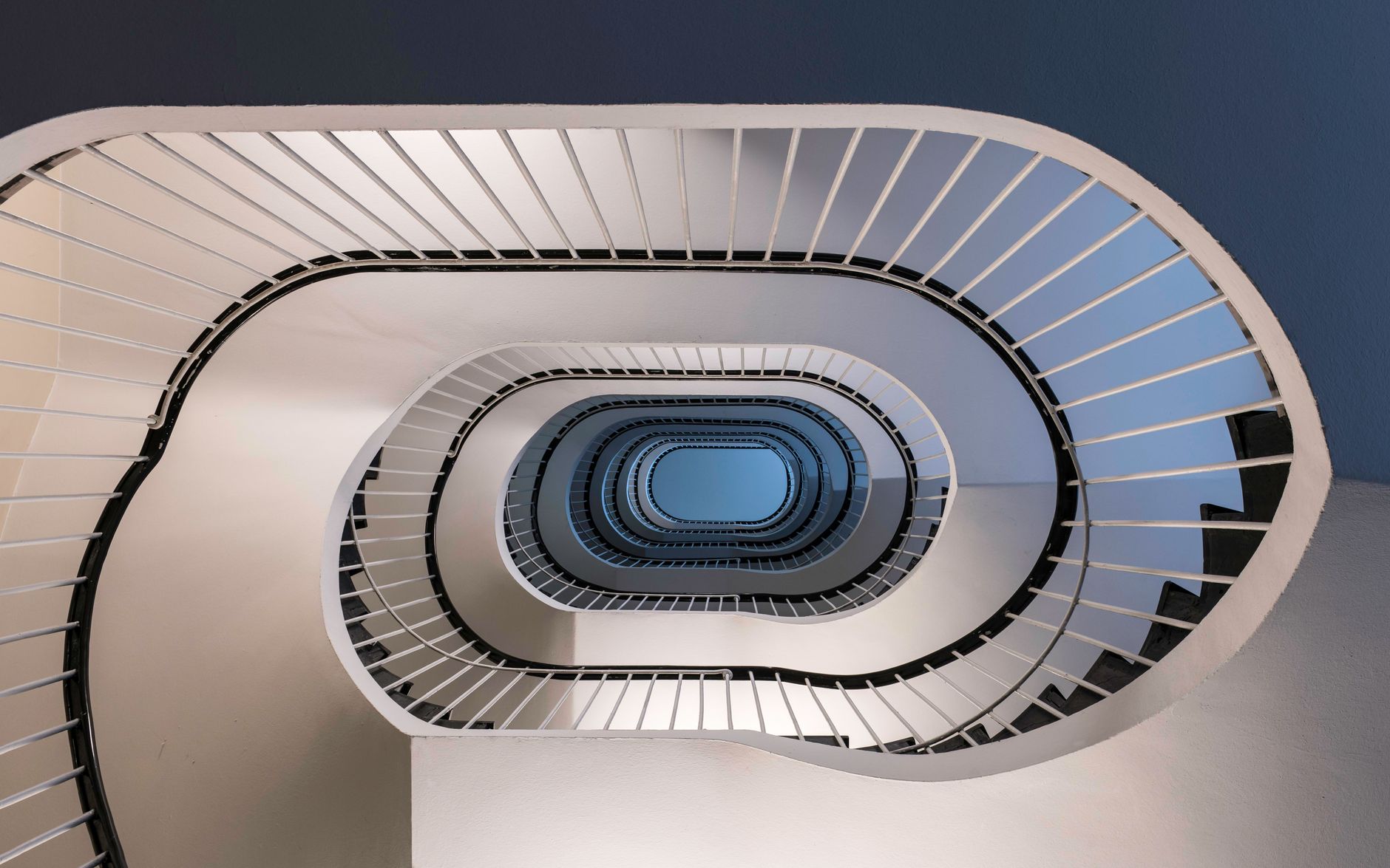 The Accelerating Cost Spiral