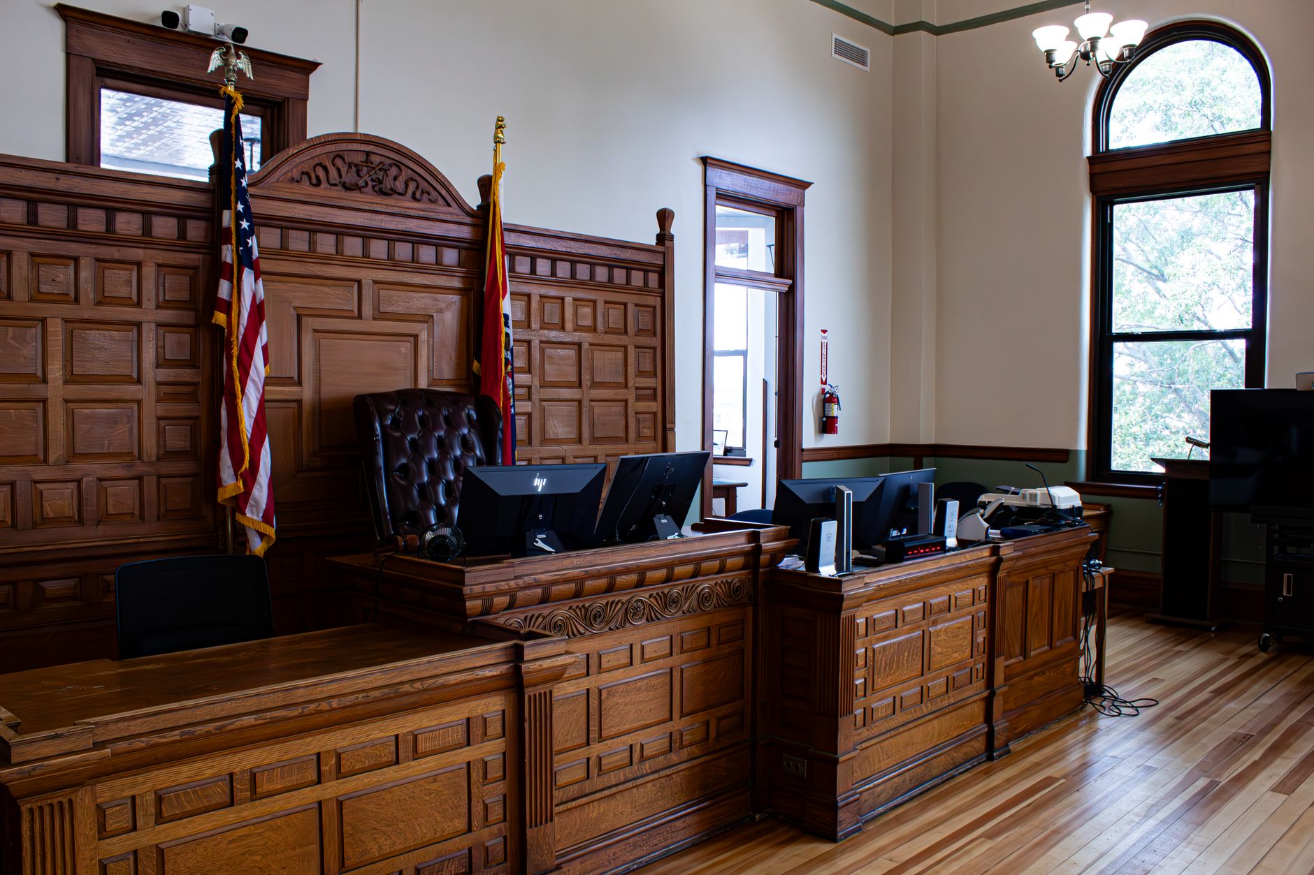 WHO CONDUCTS THE FAIR HEARING AND HOW IS IT STRUCTURED?
